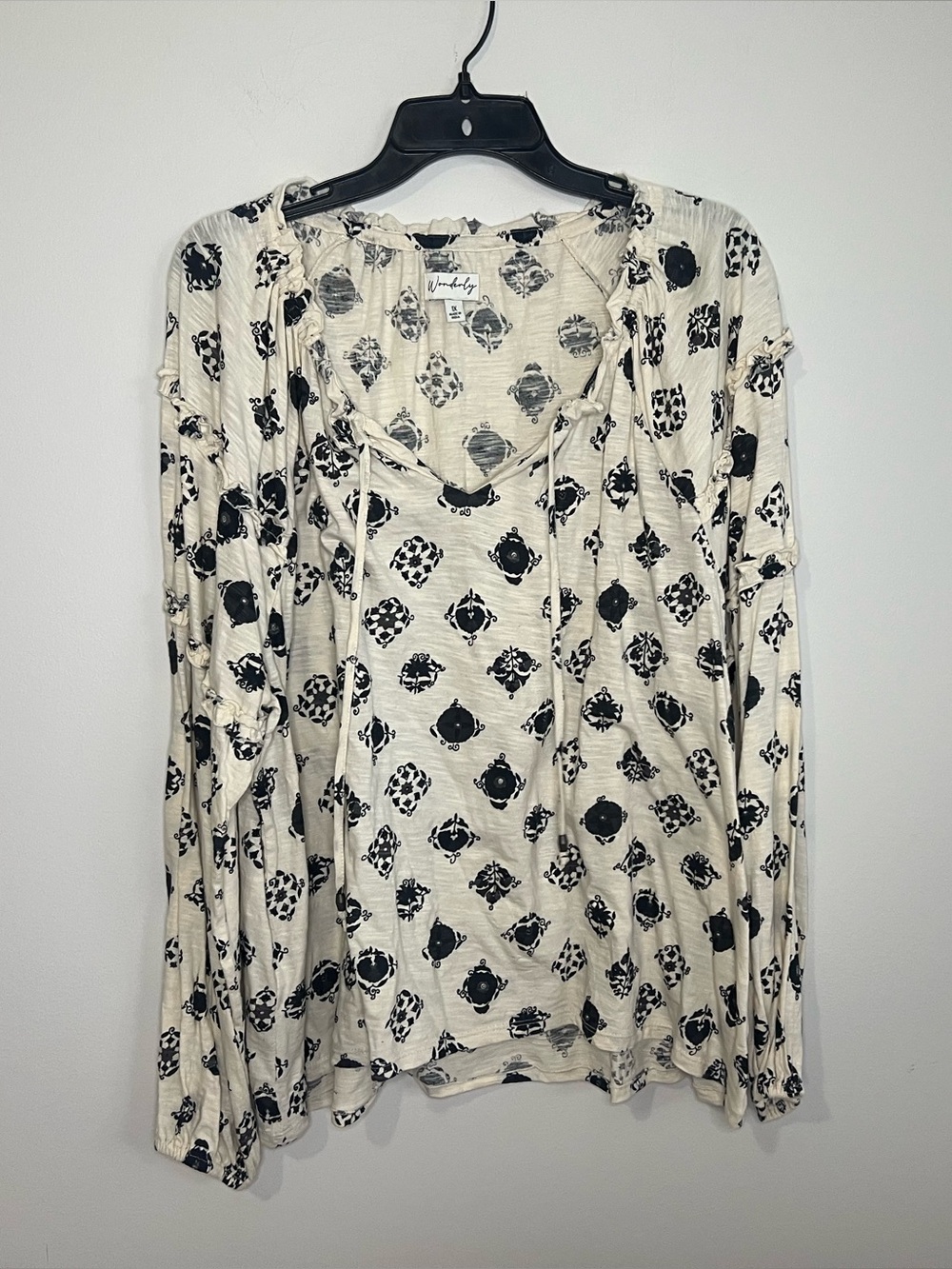 Wonderly Cream Long Sleeve Lace-Up Top with Black Geometric Print